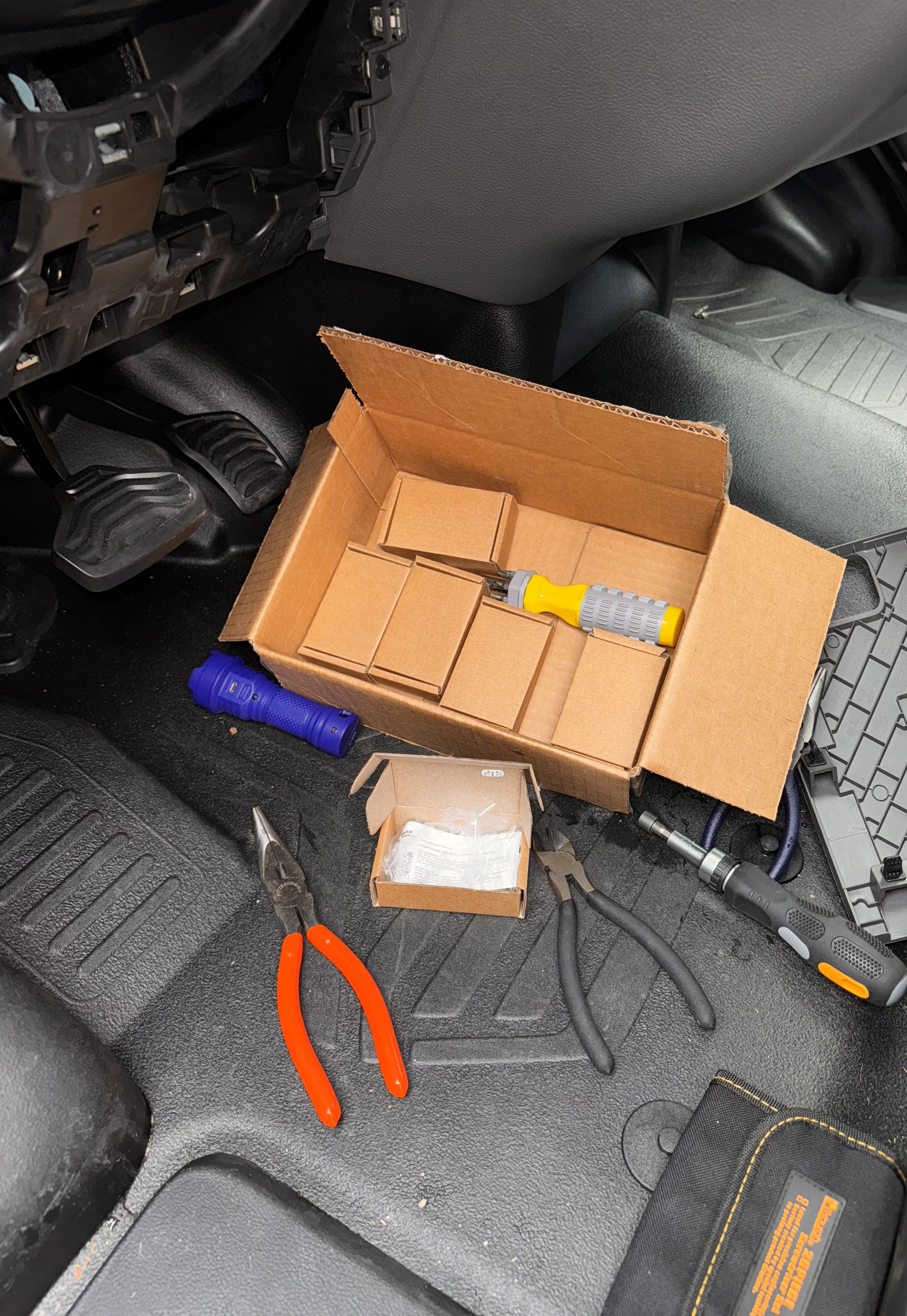 Tools prepared for a GPS tracker installation
